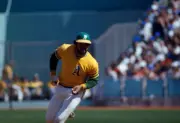 Outfielder Reggie Jackson rounds the bases after a hitting a home- 1974 Photo