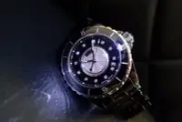 在飛比找Yahoo!奇摩拍賣優惠-CHANEL香奈兒黑陶瓷J12 半天星鑲鑽面盤機械錶