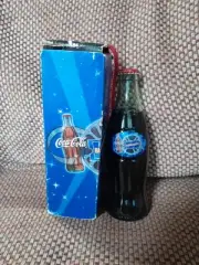 COCA COLA BLOCKBUSTER CELEBRATING 2001 BOTTLE and BOX