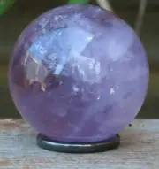 A Grade Amethyst Polished Crystal Sphere 79 Grams With Hematite Ring Purple