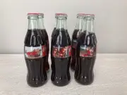 1997 Coca Cola Classic Christmas Six Pack Commemorative Bottles Santa
