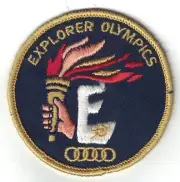 BSA Exploring program Explorer Olympics torch patch navy blue background