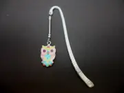 A TIBETAN SILVER BOOKMARK WITH A PINK ENAMEL OWL CHARM. NEW.