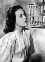 1947 Us Actress Hilda Simms Looking At A Small Bird In A Cage OLD PHOTO