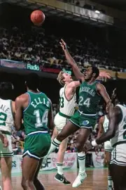 Mark Aguirre Dallas Mavericks blocks a shot attempt by Larry Bird - Old Photo