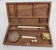 Vintage decorative boxed set magnifying glass/letter opener/stamp and ink well
