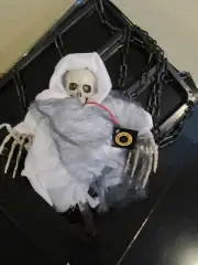REAPER CHAINED & CAGED EYES LIGHT UP MAKES LAUGHING SOUND SHAKING BODY NIB