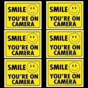 SECURITY SMILE VIDEO CAMERAS IN USE WARNING STICKER DECALS SIGNS YELLOW COLORED