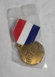 Coca-Cola Bronze Medal Ribbon Pin. Red White Blue. Unopened