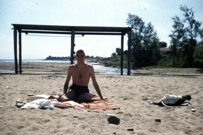1950s Red Border Kodachrome 35mm Slide Handsome Man on Beach Blanket No Shirt