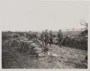 REPRINT OF ORIGINAL WWI PHOTO OF MEN NEAR MASSIVE SHELLS AT BATTLE OF FLANDERS