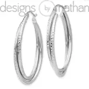 Designs by Nathan | 14k White Gold Polished and Diamond-Cut Oval Hoop Earrings