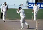 England batsman Devon Malcolm is bowled by Courtney Walsh dur- Old Cricket Photo