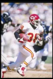 Runningback Kimble Anders Kansas City Chiefs runs down the field t- Old Photo