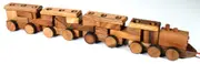 Pull along wooden train with 26 Piece, educational shapes jig-saw wooden toy.