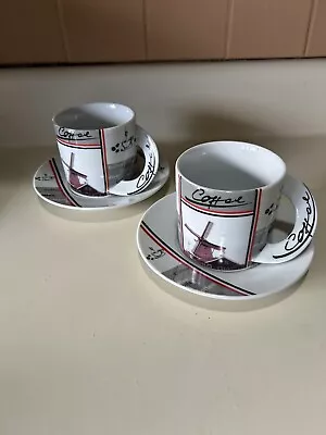 Pair of Coffee Cups and Saucers 4 Pc Total Wind Mill Symmetrical Handle Holder