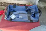Davidoff rolling duffel carry-on blue 25x11x9 inches NEW