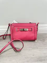 Coach SWAGGER WRISTLET CROSSBODY IN PEBBLE LEATHER