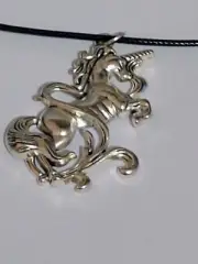 SILVER UNICORN PENDANT ON 2mm BLACK LEATHER CORD, LOBSTER CLASP.