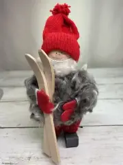 Swallings Sweden Christmas Man w/Skis Red Hat Gray Sheepskin Coat Wood 7.25"