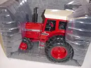 1/16 International 1566 Prestige Edition Tractor W/FWA & Duals by ERTL NIB!