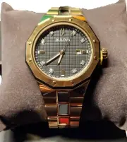 Bulova Men's Classic Stainless Steel 3-Hand Date Quartz Watch with Diamonds 44mm