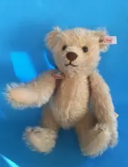 STEIFF '' SEYMORE C. TRADER" EAN 680069 SHAGGY BEIGE MOHAIR DISNEY EVENT BEAR