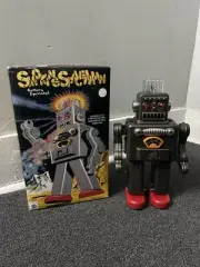 Smoking Spaceman Tin Toy Battery Operated production NEW Factory Direct. (M)