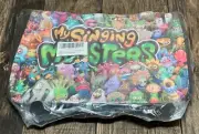 NWT My Singing Monsters Game Laptop Or Travel Backpack The Back is Solid Black