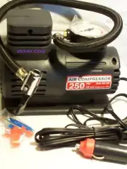 AIR COMPRESSOR MINI- 12 VOLT- PORTABLE - NEW.