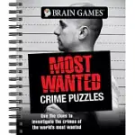 BRAIN GAMES - MOST WANTED CRIME PUZZLES: USE THE CLUES TO INVESTIGATE THE CRIMES OF THE WORLD’’S MOST WANTED