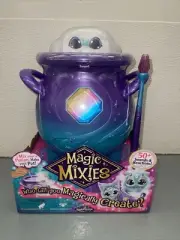 Magic Mixies Magical Misting Cauldron with Interactive Blue Plush Toy