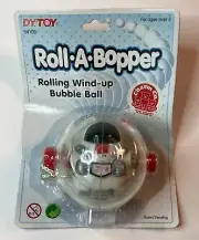 NOS ROLL A BOPPER DAH YANG TOYS WIND UP SPACEMAN ASTRONAUT TOY #9410B AGES 3+