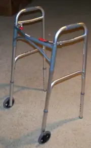Drive Deluxe Folding Walker #10210-4ASM Two Button w/5" Wheels 350lbs Cap M4944