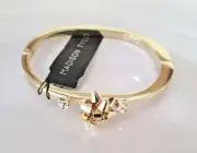 Madison TYLER Holiday Collection Hinge Bow Crystal Bracelet Bangle Gold Tone