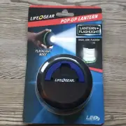 2-in-1 Puck Flashlight or Pop-Up LED Mini Lantern Black/Blu AA Battery Operated