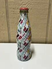 2016 WORLD OF COCA COLA ORLANDO ICE COLD SUNSHINE 8OZ WRAPPED COCA COLA BOTTLE