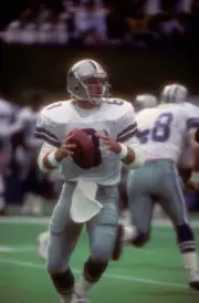 Quarterback Troy Aikman of the Dallas Cowboys drops back to pass - Old Photo