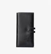 MilkYa Wallet Hand Holding A Foreskin Clip