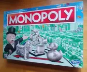 Monopoly board game different tokens pieces dragon, duck, cat and penguin. (13)