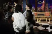 Actor Sacha Baron Cohen as Borat greets the audience on October 9 - Old Photo