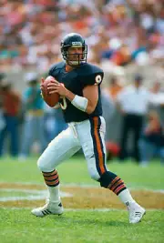 Jim McMahon Chicago Bears drops back to pass in an NFL F- Football 1988 Photo