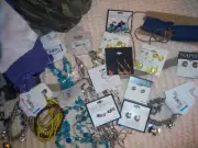LOT OF JEWELRY, WHITE GLOVES, ARMY CAPS, SCARF, EARRINGS, BRACELETS OVER $650.00