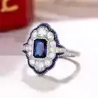 2Ct Emerald Cut Lab Created Sapphire Cocktail Ring 14k White Gold Plated Silver