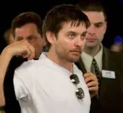 Actor Tobey Maguire gets up from his poker table during a break on - Old Photo