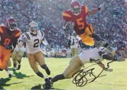 SIGNED A4 PHOTO - REGGIE BUSH - USC TROJANS - HEISMAN - NFL - SAINTS - DOLPHINS