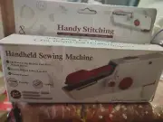NIB HAND HELD SEWING MACHINE