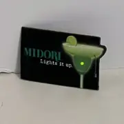 Midori lights it up pin blinks works melon liqueur green light