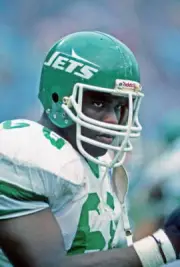 Offensive lineman Reggie McElroy New York Jets looks on from the s- Old Photo