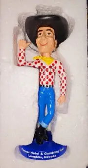 Pioneer Hotel bobble head figure